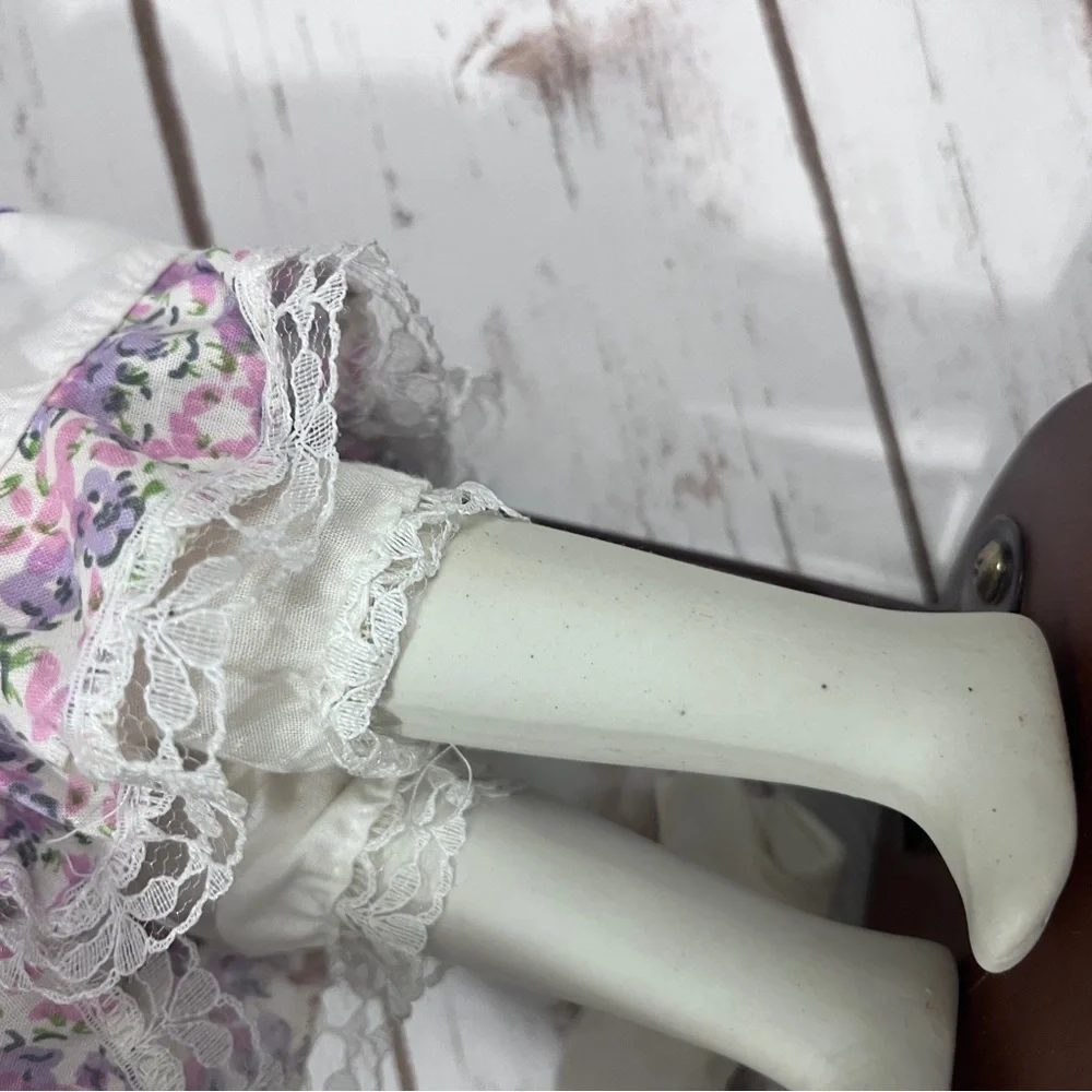 Porcelain Doll with purple floral dress and‎ Hat vintage